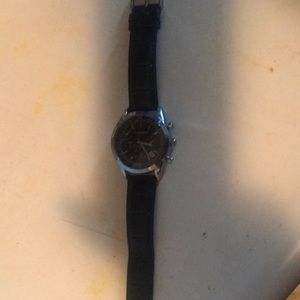 Blue with leather brand and nice water resistant and brand new have box, everyth